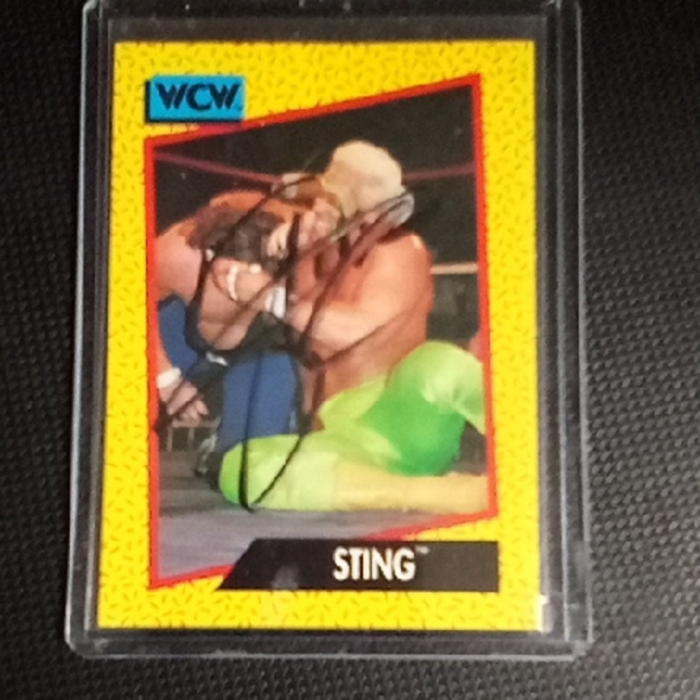 Dynamic Yellow and Green Wrestling Card with Intense Action